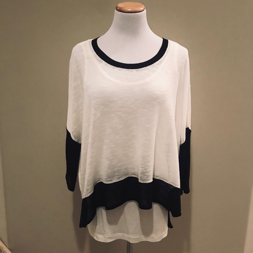 white and black sweater